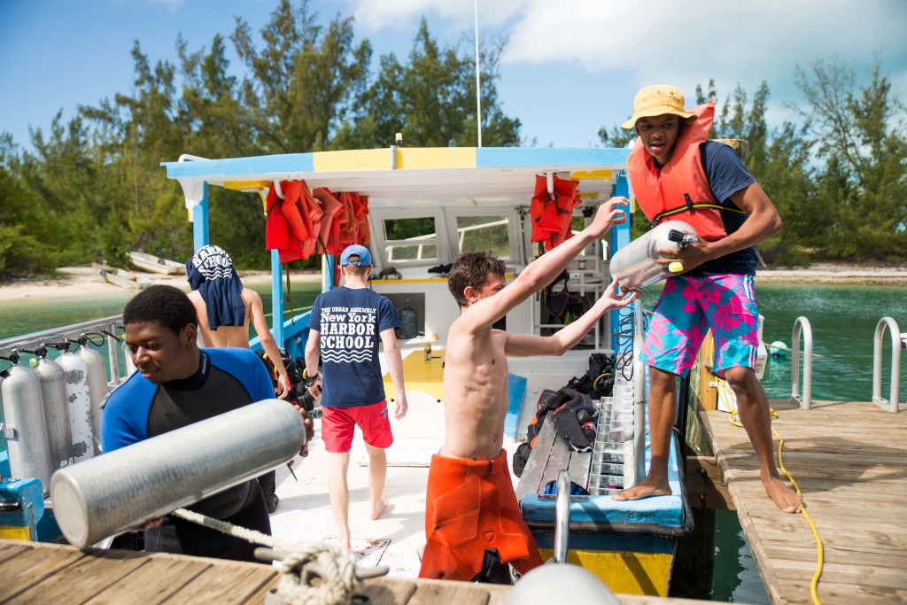 Unloading empty tanks off the Cobia