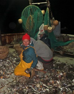 Ami working alongside fishermen on a shrimp trawler in the Gulf of California