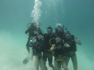 Having performed their final skill, these students are now fully certified divers.