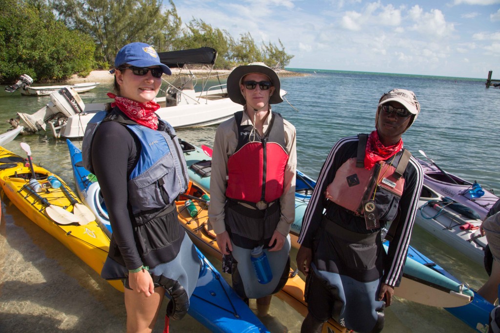 Kerwin, Ellie and Peter K. take a moment to pose for a photo before heading out on their kayak trip.